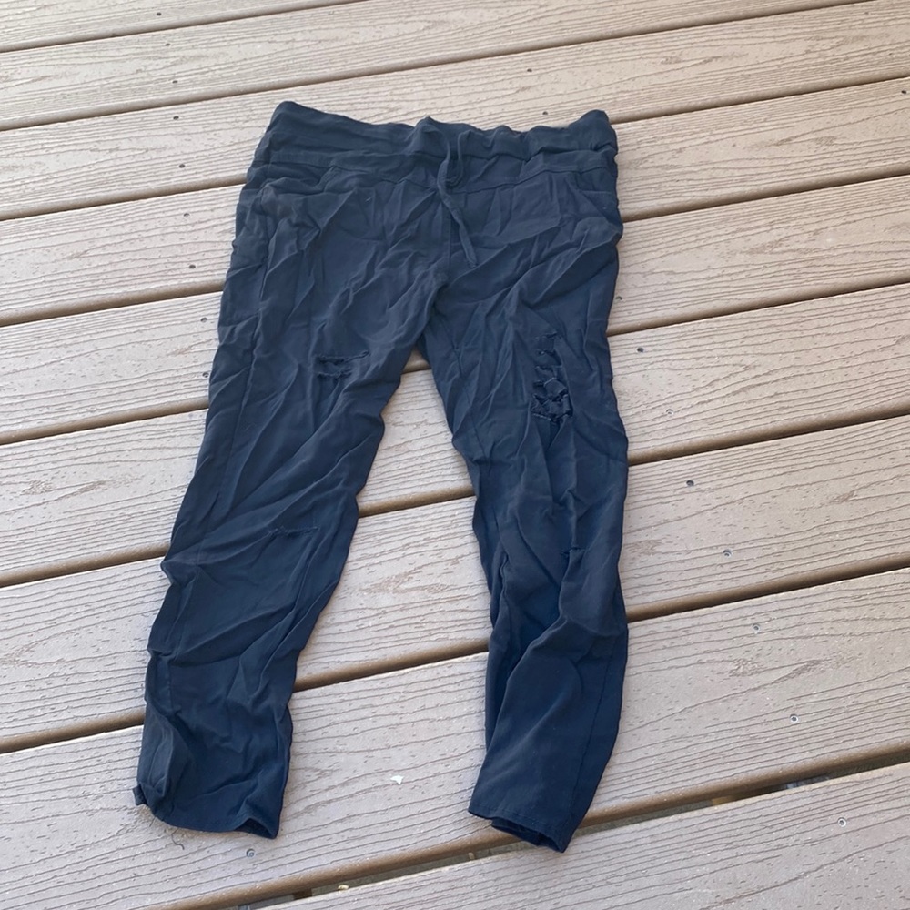 Black ripped stretchy pants.